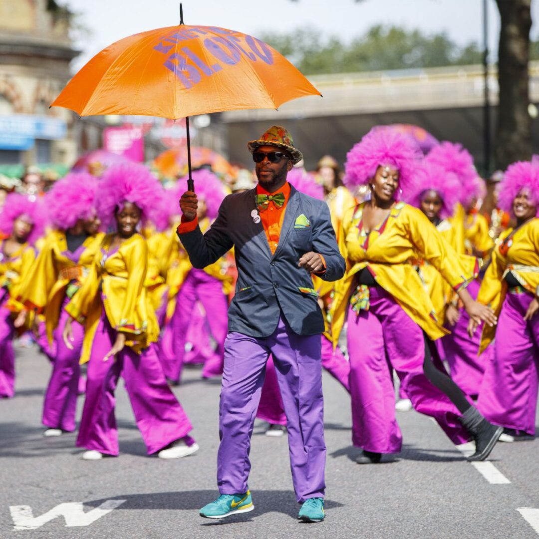 © Licensed to London News Pictures. 24/08/2014. LONDON, UK. Dancers parading at Notting Hill Carnival on family day, Sunday 24 August 2014. Photo credit : Tolga Akmen/LNP